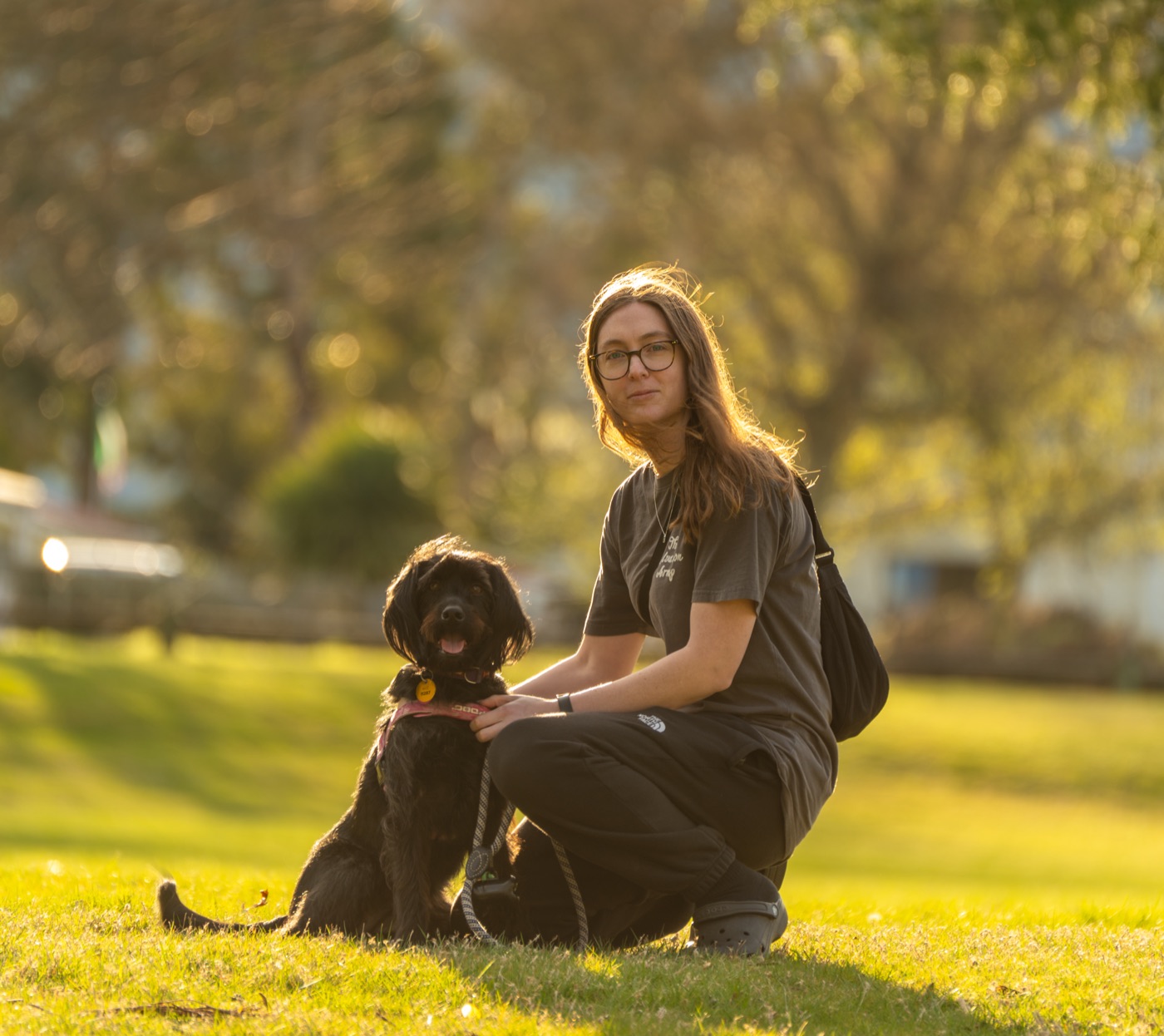 Child on a hillside at golden hour